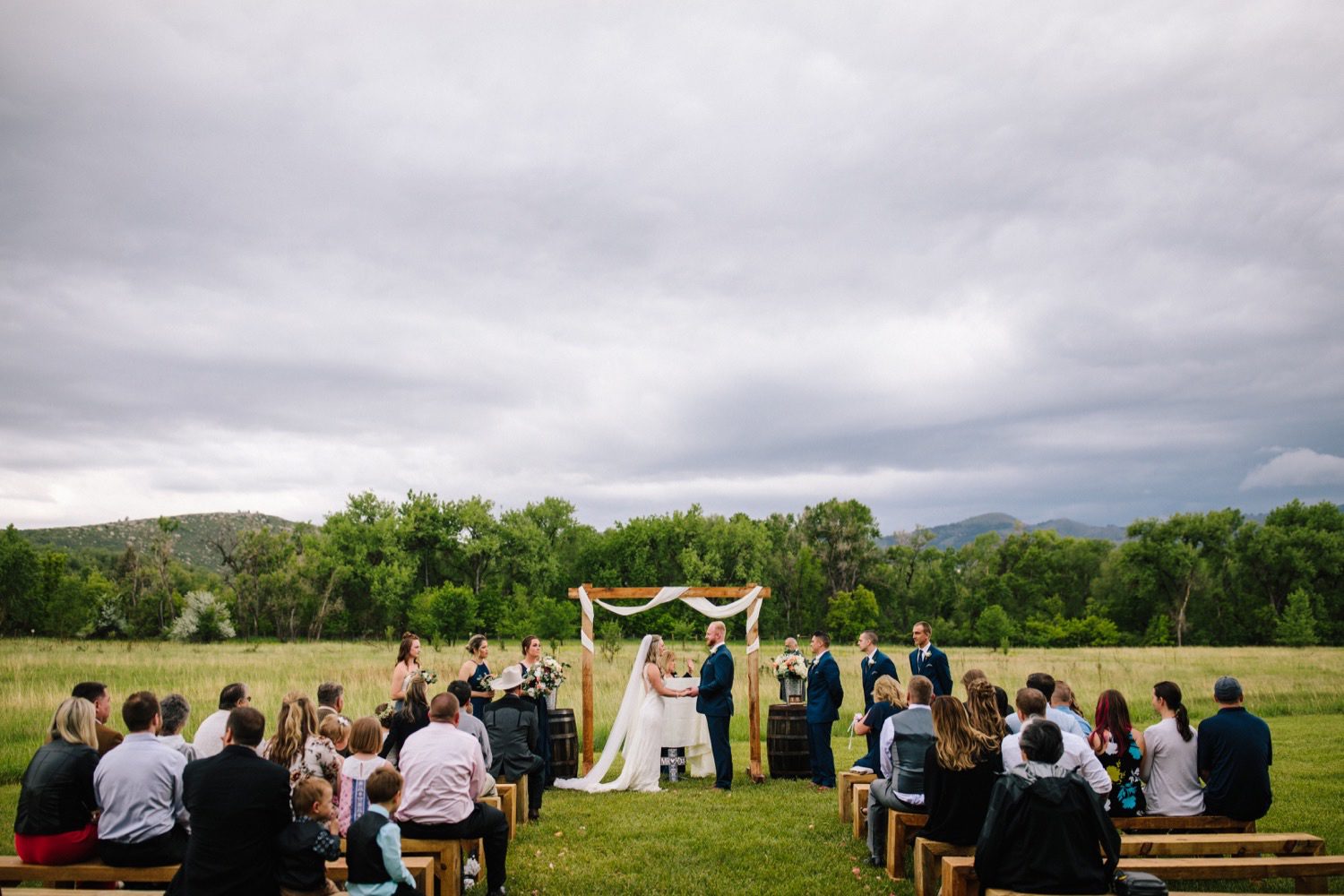 Rist Canyon Inn Wedding, Fort Collins Wedding, Colorado Wedding, Colorado Elopement, Colorado Mountain Wedding, Colorado Wedding Photographer, Colorado Elopement Photographer, Spring Wedding, Wedding Photography, Documentary Wedding Photography, Photojournalistic Wedding Photography, Wedding Inspiration, Wedding Ideas, Wedding Photos, Anna Be Wedding Dress, Compass Rose Floral, Cathedral Veil, Bride and Groom, Wedding Ceremony, Outdoor Wedding Ceremony, Wooden Altar, Wedding Arch with Tulle