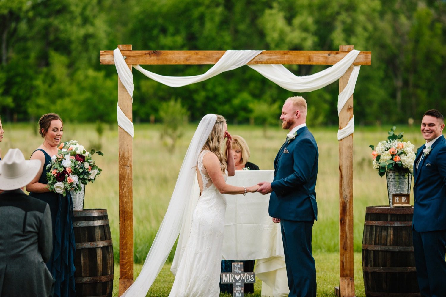 Rist Canyon Inn Wedding, Fort Collins Wedding, Colorado Wedding, Colorado Elopement, Colorado Mountain Wedding, Colorado Wedding Photographer, Colorado Elopement Photographer, Spring Wedding, Wedding Photography, Documentary Wedding Photography, Photojournalistic Wedding Photography, Wedding Inspiration, Wedding Ideas, Wedding Photos, Anna Be Wedding Dress, Compass Rose Floral, Cathedral Veil, Bride and Groom, Wedding Ceremony, Outdoor Wedding Ceremony, Wooden Altar, Wedding Arch with Tulle