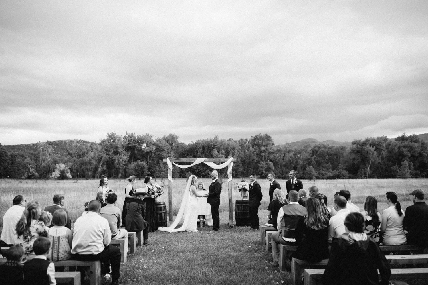 Rist Canyon Inn Wedding, Fort Collins Wedding, Colorado Wedding, Colorado Elopement, Colorado Mountain Wedding, Colorado Wedding Photographer, Colorado Elopement Photographer, Spring Wedding, Wedding Photography, Documentary Wedding Photography, Photojournalistic Wedding Photography, Wedding Inspiration, Wedding Ideas, Wedding Photos, Anna Be Wedding Dress, Compass Rose Floral, Cathedral Veil, Bride and Groom, Wedding Ceremony, Outdoor Wedding Ceremony, Wooden Altar, Wedding Arch with Tulle