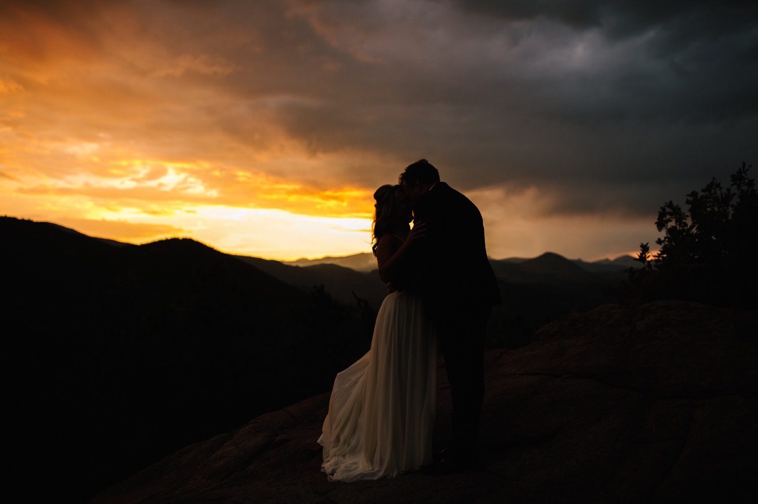 Silhouette of bride and groom at Colorado Mountain Elopement