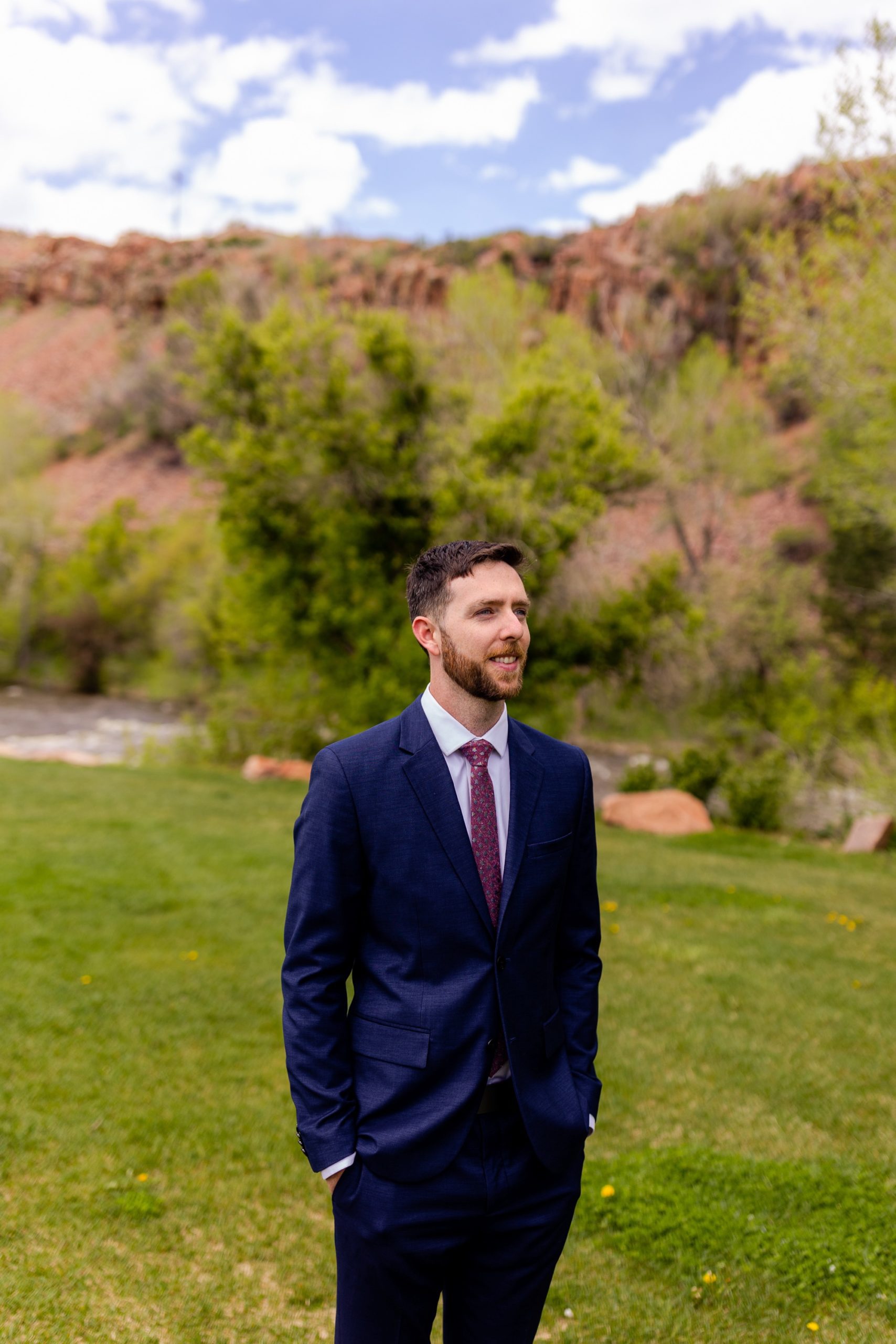 First look, navy groom suit, jewel tone wedding colors, Groomsmen suits, Planet Bluegrass Lyons Colorado