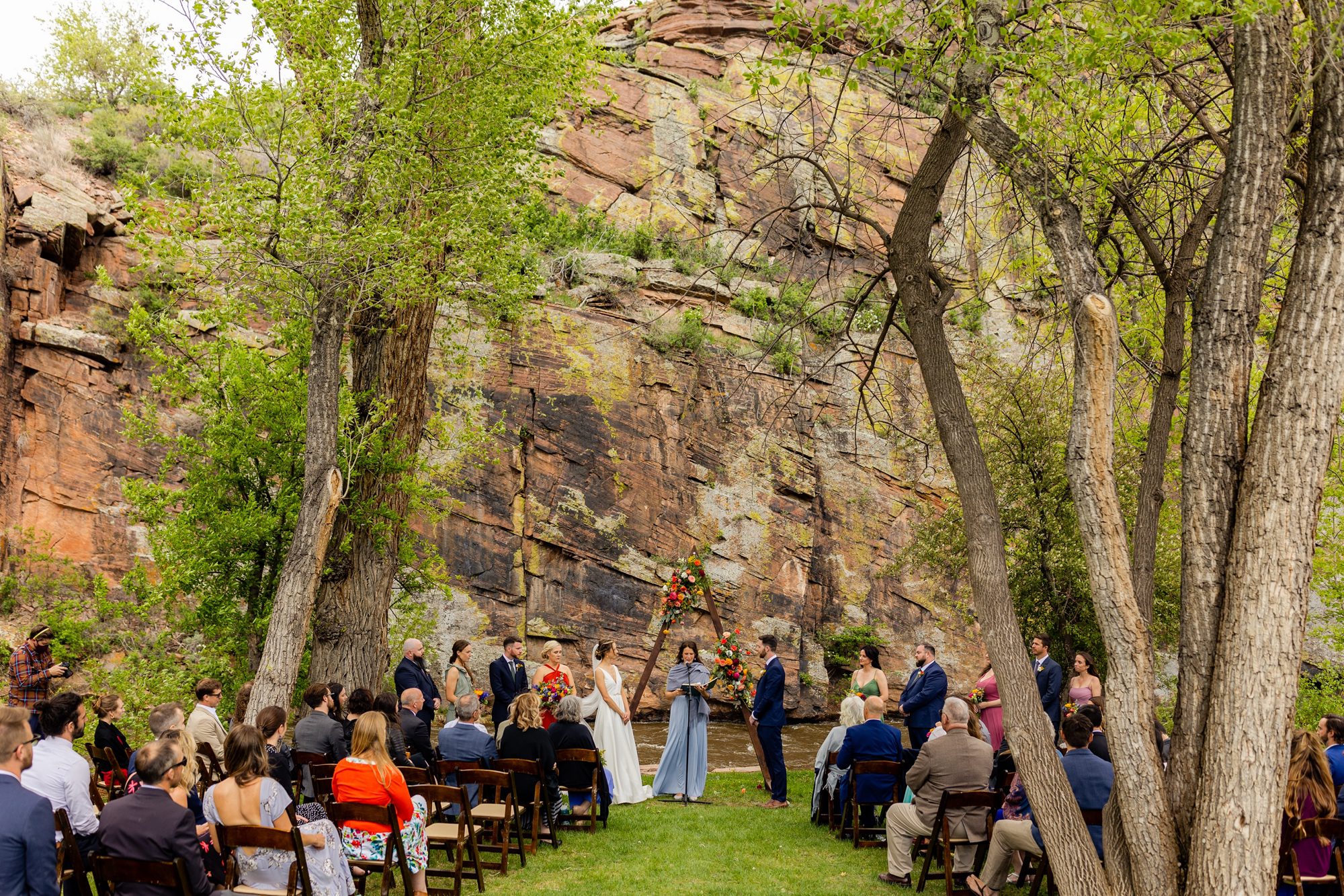 Planet Bluegrass Wedding venue in Lyons Colorado: Colorado Wedding Photographer, Wedding ceremony, Triangle wedding arch, Triangle wedding altar