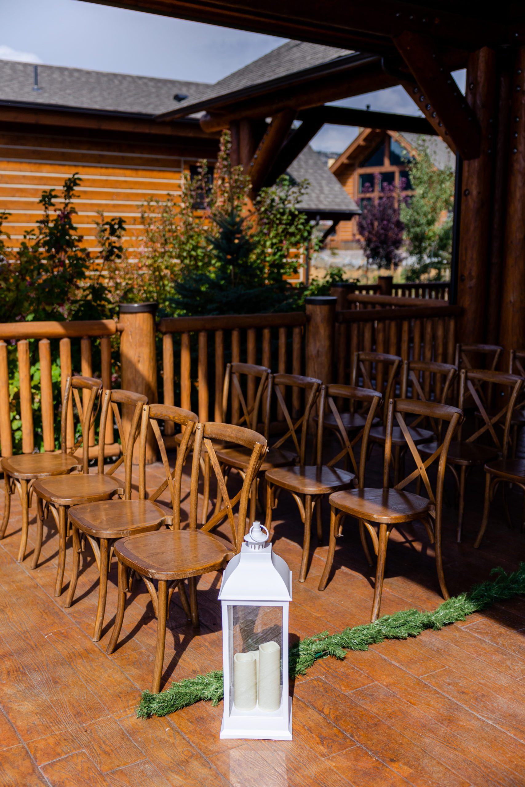 Lantern and pine wedding aisle runner at Estes Park Resort for a destination wedding in Colorado