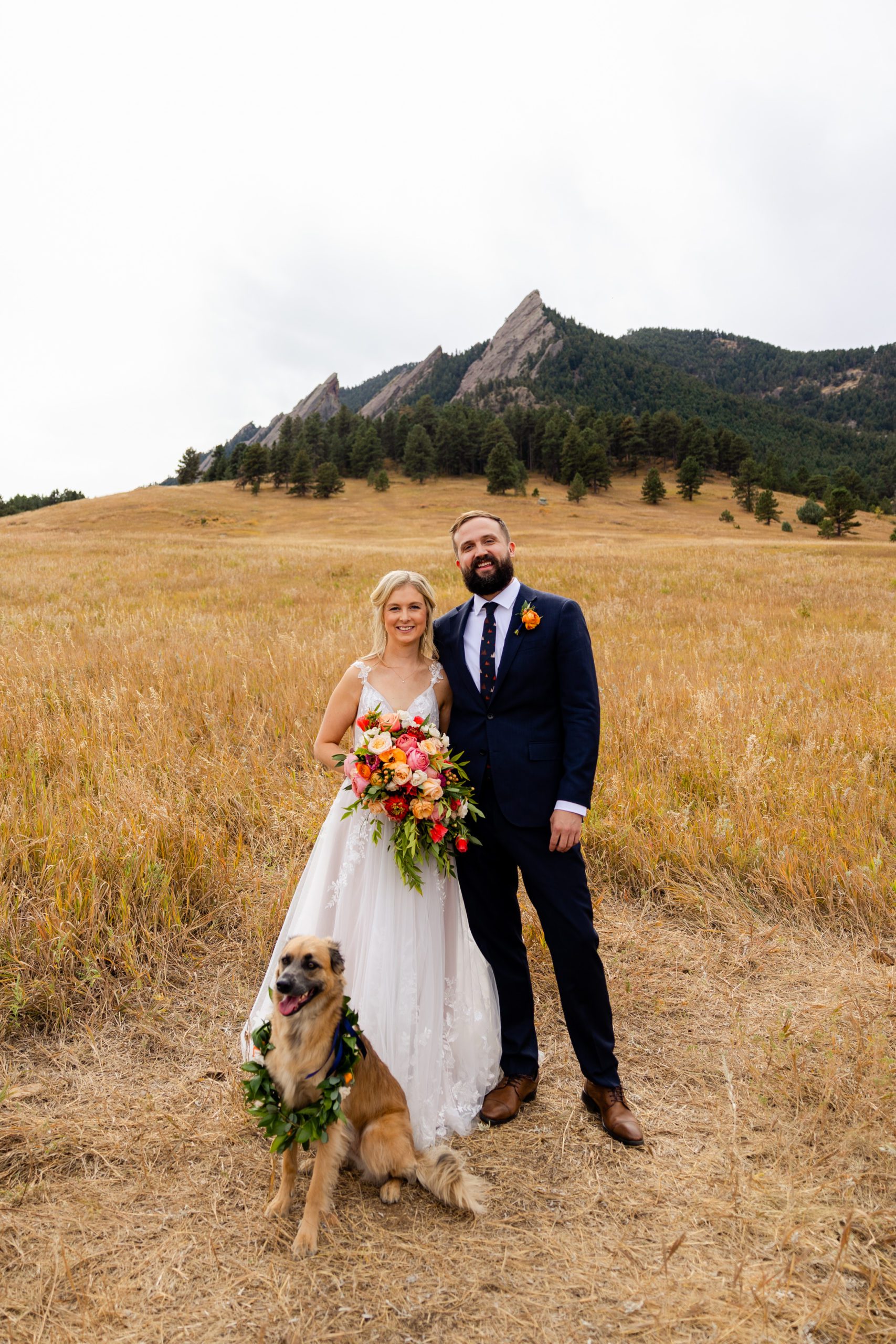 Bride and groom wedding photo with dog on Chautauqua Trail in Boulder