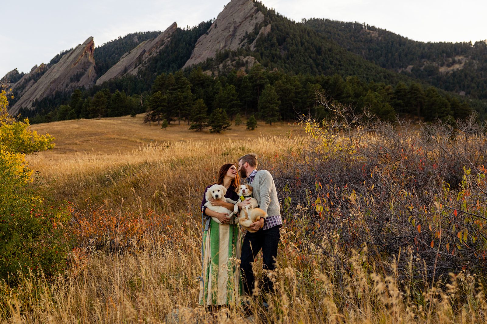 Engagement photos with dogs in Boulder Colorado on Chautauqua Trail, fall engagement photos