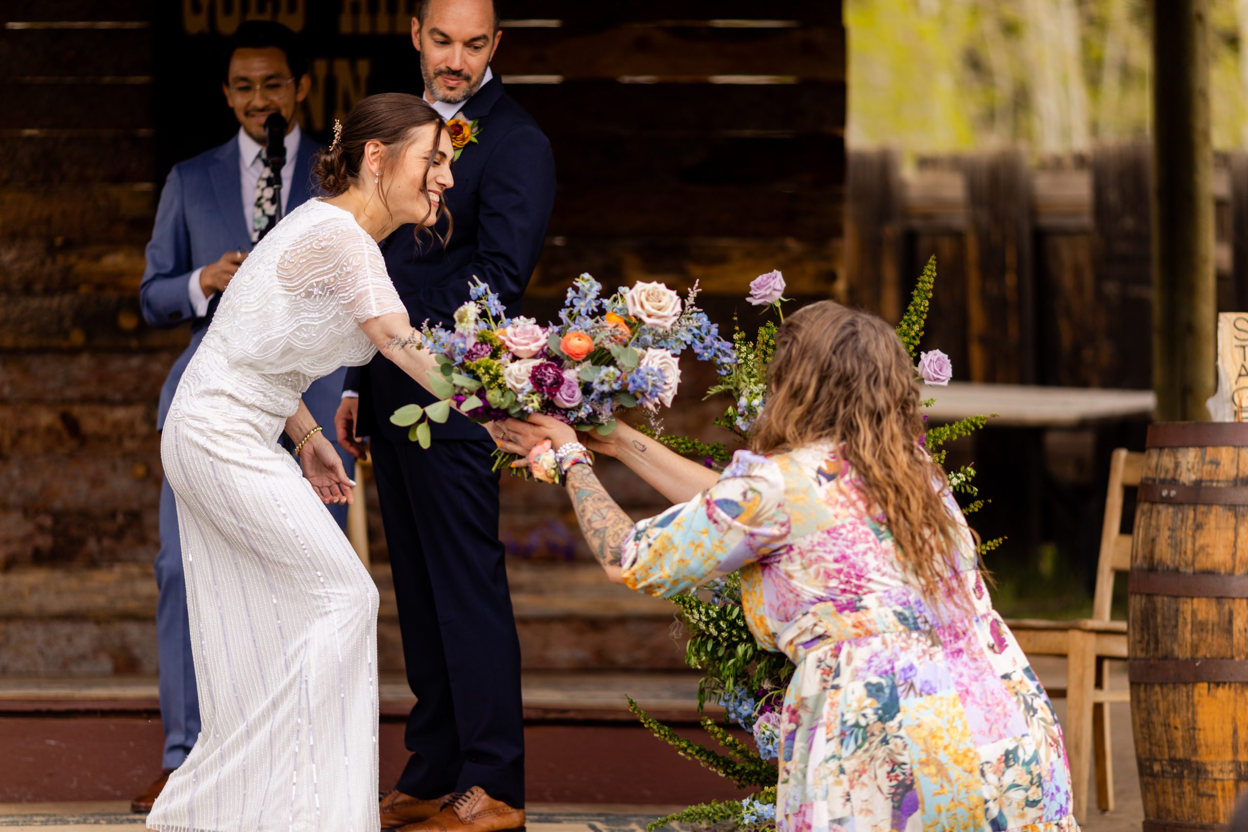 Wedding ceremony at Gold Hill Inn and Bluebird Lodge in Boulder Colorado with flowers by A Florae, Rocky Mountain Bride, Martha Stewart Weddings