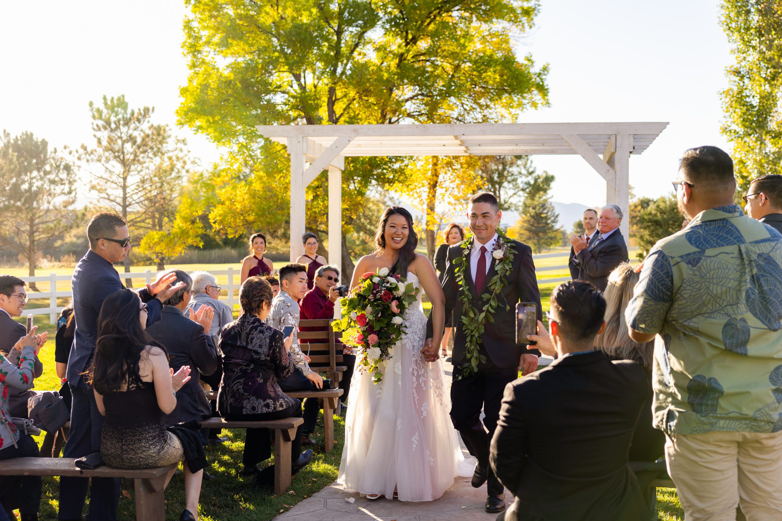 Fall wedding at The Barn at Raccoon Creek in Littleton Colorado, Sola wood wedding flowers, Wedding Lei, Hawaii wedding traditions