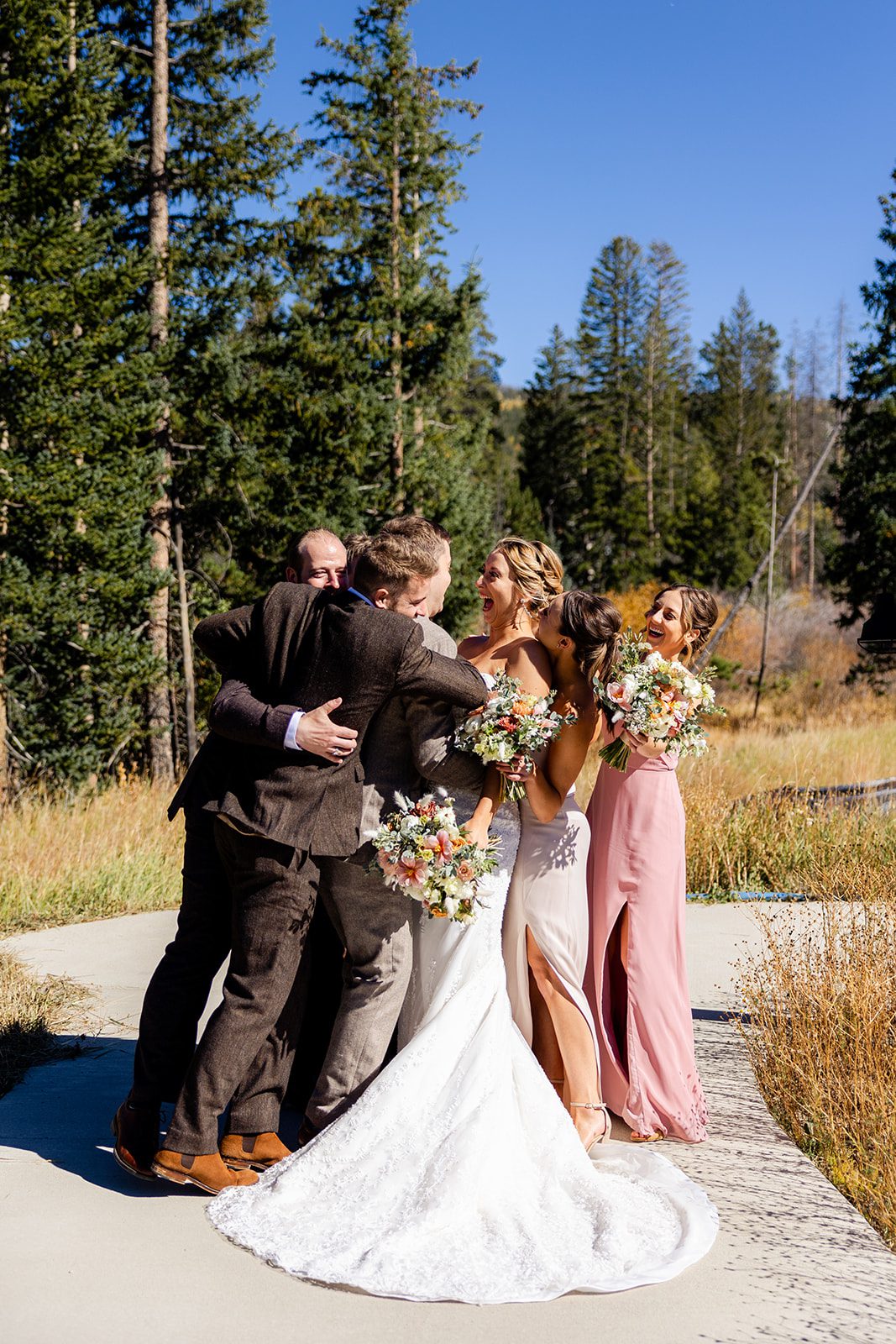 Headwaters Center Headwaters River Journey wedding in Winter Park Colorado, fun bridal party poses