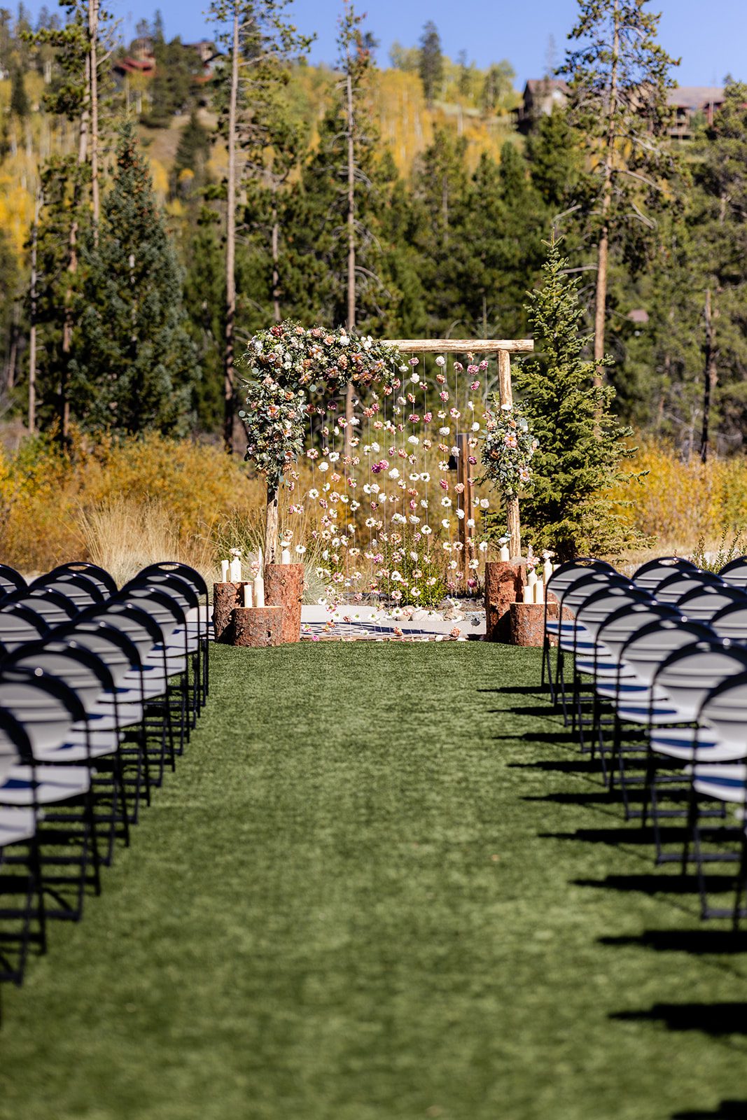 Headwaters Center Headwaters River Journey wedding in Winter Park Colorado, Floral wedding arch, The Stalk Market Florist Colorado, Wedding arch flowers, Floral wedding backdrop