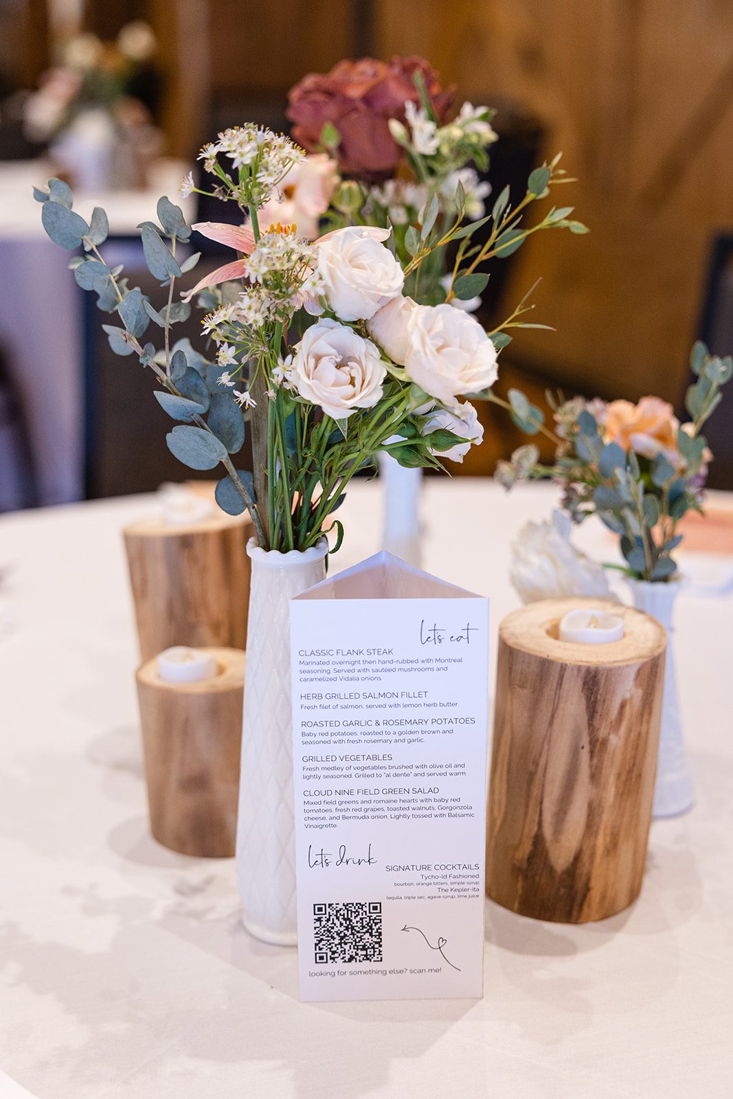 Simple wedding centerpiece with vase and flowers