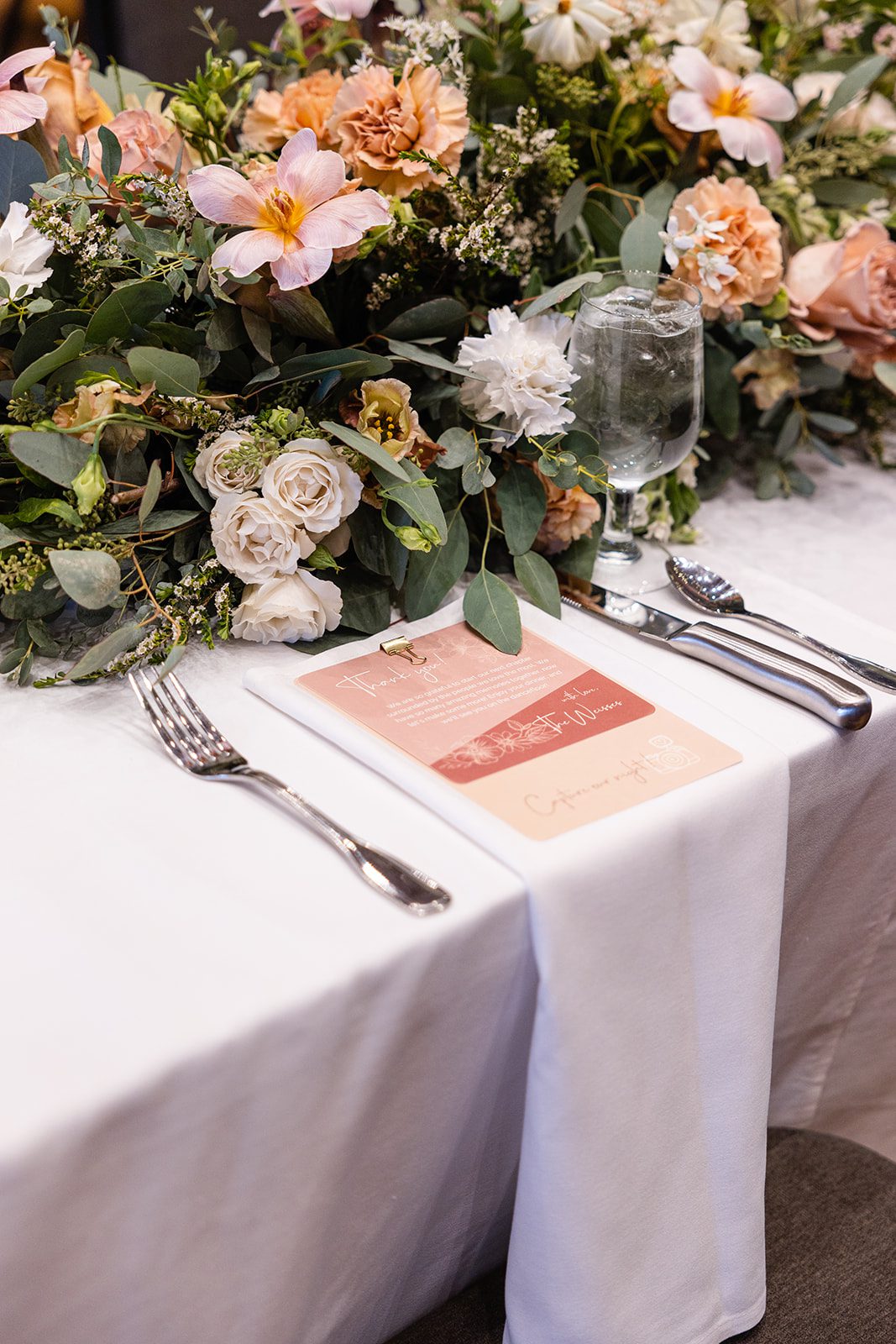 Simple wedding centerpiece with vase and flowers