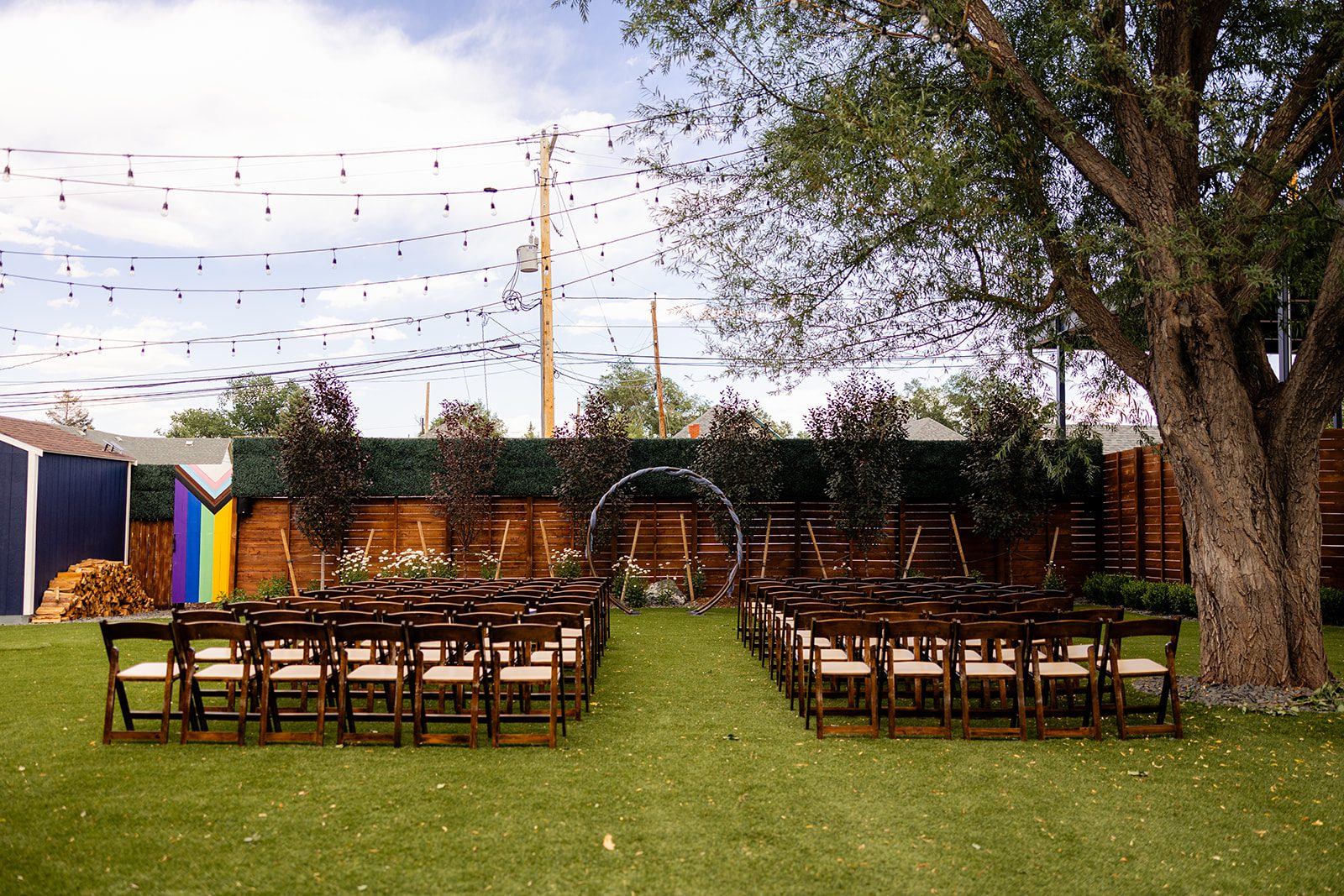 Mountain Crust Event Venue Wedding in Denver Colorado, Mountain Crust Pizza, Wooden wedding ceremony chairs